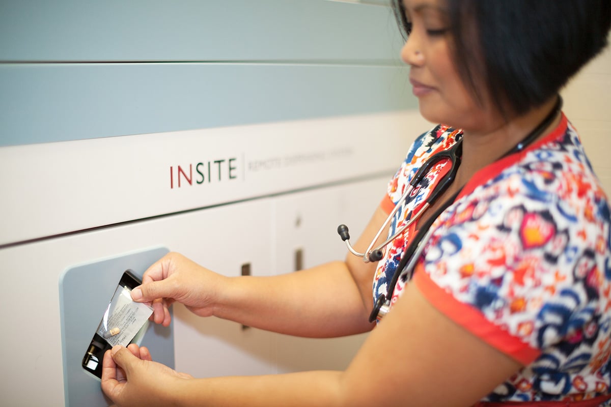 A nurse getting medicine for a patient at Lincoln Meadows